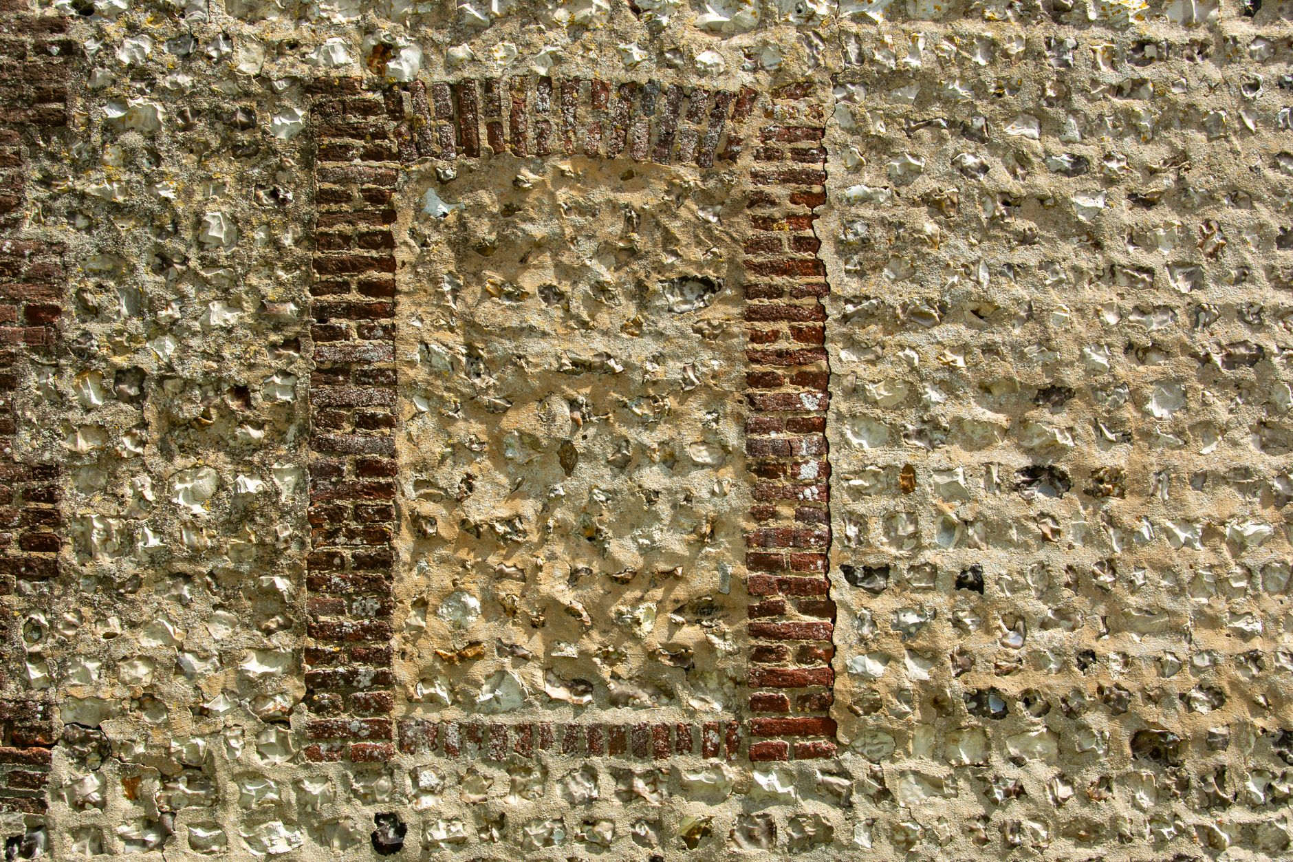 Close-up of canal lock chamber stonework showing lime deposits and biological growth from canal lock weathering